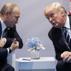 FILE - In this file photo taken on Friday, July 7, 2017, U.S. President Donald Trump, right, meets with Russian President Vladimir Putin at the G-20 Summit in Hamburg, Germany. The Kremlin said Trump called Putin to congratulate him on re-election, and White House press secretary Sarah Huckabee Sanders confirmed that Trump spoke with Putin Tuesday March 20, 2018. (AP Photo/Evan Vucci),Image: 679381384, License: Rights-managed, Restrictions: Archivní snímek ze 7. července 2017, Model Release: no, Credit line: ČTK / AP / Evan Vucci