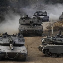 Israeli army tanks manoeuvre in a staging area in northern Israel near the Israel-Lebanon border, Tuesday, Oct. 1, 2024. (AP Photo/Baz Ratner),Image: 914696002, License: Rights-managed, Restrictions: This content is intended for editorial use only. For other uses, additional clearances may be required., Model Release: no, Credit line: ČTK / AP / Baz Ratner