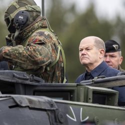 German Chancellor Olaf Scholz rides on an armored military vehicle during the Lithuanian-German military exercise 'Grand Quadriga' at a training range in Pabrade, north of the capital Vilnius, Lithuania on Monday, May 6, 2024. (AP Photo/Mindaugas Kulbis),Image: 870628217, License: Rights-managed, Restrictions: This content is intended for editorial use only. For other uses, additional clearances may be required., Model Release: no, Credit line: ČTK / AP / Mindaugas Kulbis