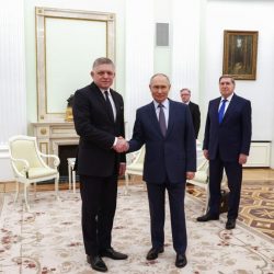 8834844 22.12.2024 Russian President Vladimir Putin and Slovak Prime Minister Robert Fico, left, shake hands as they pose for a photo before a meeting at the Kremlin in Moscow, Russia.  / POOL,Image: 949303622, License: Rights-managed, Restrictions: Editors' note: THIS IMAGE IS PROVIDED BY RUSSIAN STATE-OWNED AGENCY SPUTNIK., Model Release: no, Credit line: Artyom Geodakyan / Sputnik / Profimedia