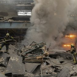 Ukrainian rescuers work at the site of a rocket attack on a civilian factory in Kharkiv, northeastern Ukraine, 29 December 2023, amid the Russian invasion. At least 16 people have died and dozens more injured after Russia launched a wave of airstrikes across Ukraine, Ukrainian authorities said on 29 December. Strikes were reported in Kyiv, Lviv, Odesa, Dnipro, Kharkiv, Zaporizhzhia, and other Ukrainian cities. Russia launched 'more than 150 missiles and combat drones' at Ukrainian cities, Ukraine's Prosecutor General Andriy Kostin said in a statement, adding that extensive damage included residential buildings, educational institutions and hospitals. Russian troops entered Ukraine on 24 February 2022 starting a conflict that has provoked destruction and a humanitarian crisis.,Image: 833038077, License: Rights-managed, Restrictions: , Model Release: no, Credit line: Profimedia