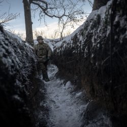 KHARKIV OBLAST, UKRAINE - JANUARY 7: A Ukrainian infantryman keeps the watch in the trenches on the front line, which is considered as 'zero', in the direction of Kupiansk, where clashes between Russia and Ukraine continue to take place, in Kupiansk city of Kharkiv, Ukraine on January 7, 2024. As temperatures drop to minus 15 during the day and as low as minus 25 at night, the Ukrainian soldiers keep their positions under the harsh winter conditions. Ozge Elif Kizil / Anadolu,Image: 835418787, License: Rights-managed, Restrictions: , Model Release: no, Credit line: Profimedia