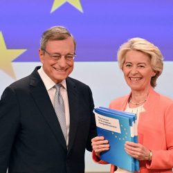 Italian former prime minister and economist Mario Draghi (L) and European Commission President Ursula von der Leyen pose together during a press conference on the future of European competitiveness, at the EU headquarters in Brussels on September 9, 2024. (Photo by Nicolas TUCAT / AFP)