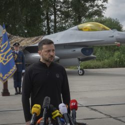 Ukraine's President Volodymyr Zelenskyy answers media questions standing against the background of Ukraine's Air Force's F-16 fighter jets in an undisclosed location in Ukraine, Sunday, Aug. 4, 2024. The F-16 fighter jets that have been delivered to Ukraine by Western countries will be flying sorties in Ukrainian skies and helping the country's current fleet of Soviet-era jets to counter Russia's invasion. (AP Photo/Efrem Lukatsky),Image: 895884696, License: Rights-managed, Restrictions: This content is intended for editorial use only. For other uses, additional clearances may be required., Model Release: no, Credit line: ČTK / AP / Efrem Lukatsky