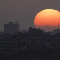 The sun sets behind the buildings in the Gaza Strip as seen from southern Israel, Saturday, June 29, 2024. (AP Photo/Leo Correa),Image: 885790652, License: Rights-managed, Restrictions: This content is intended for editorial use only. For other uses, additional clearances may be required., Model Release: no, Credit line: ČTK / AP / Leo Correa